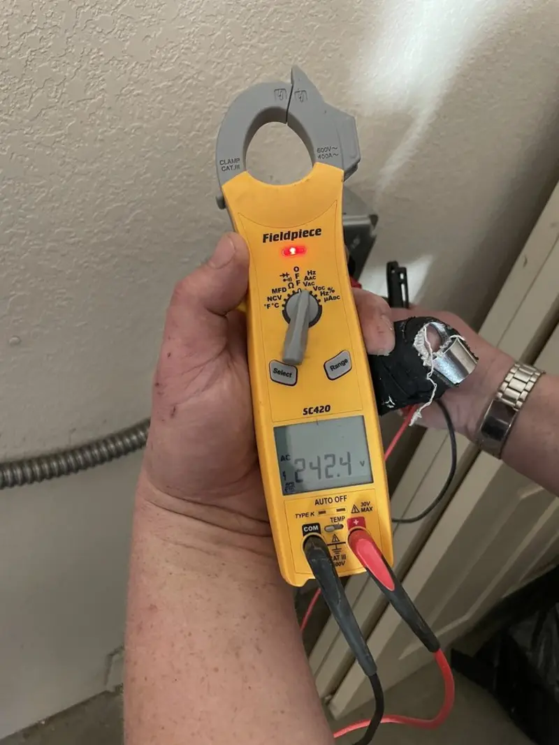 Voltage testing with clamp meter during Recessed Lighting Installation in Loma Linda